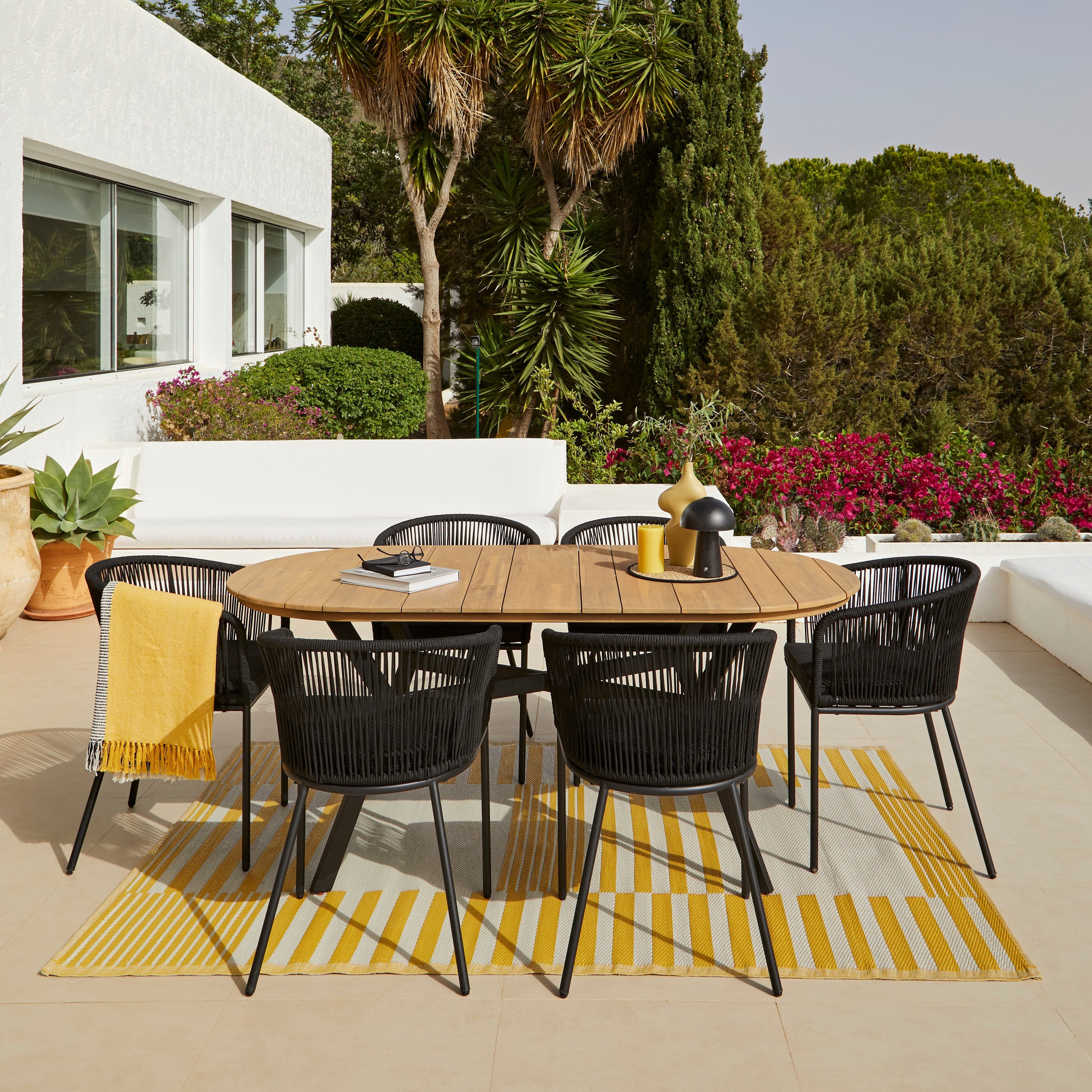 Ezra 6 Seater Oval Wooden Garden Dining Set with 6 Hali Black Rope Chairs - Laura James 